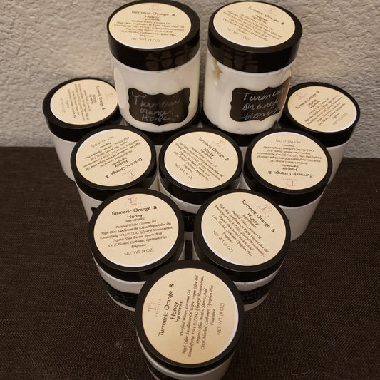 Multiple jars with labels on a textured surface